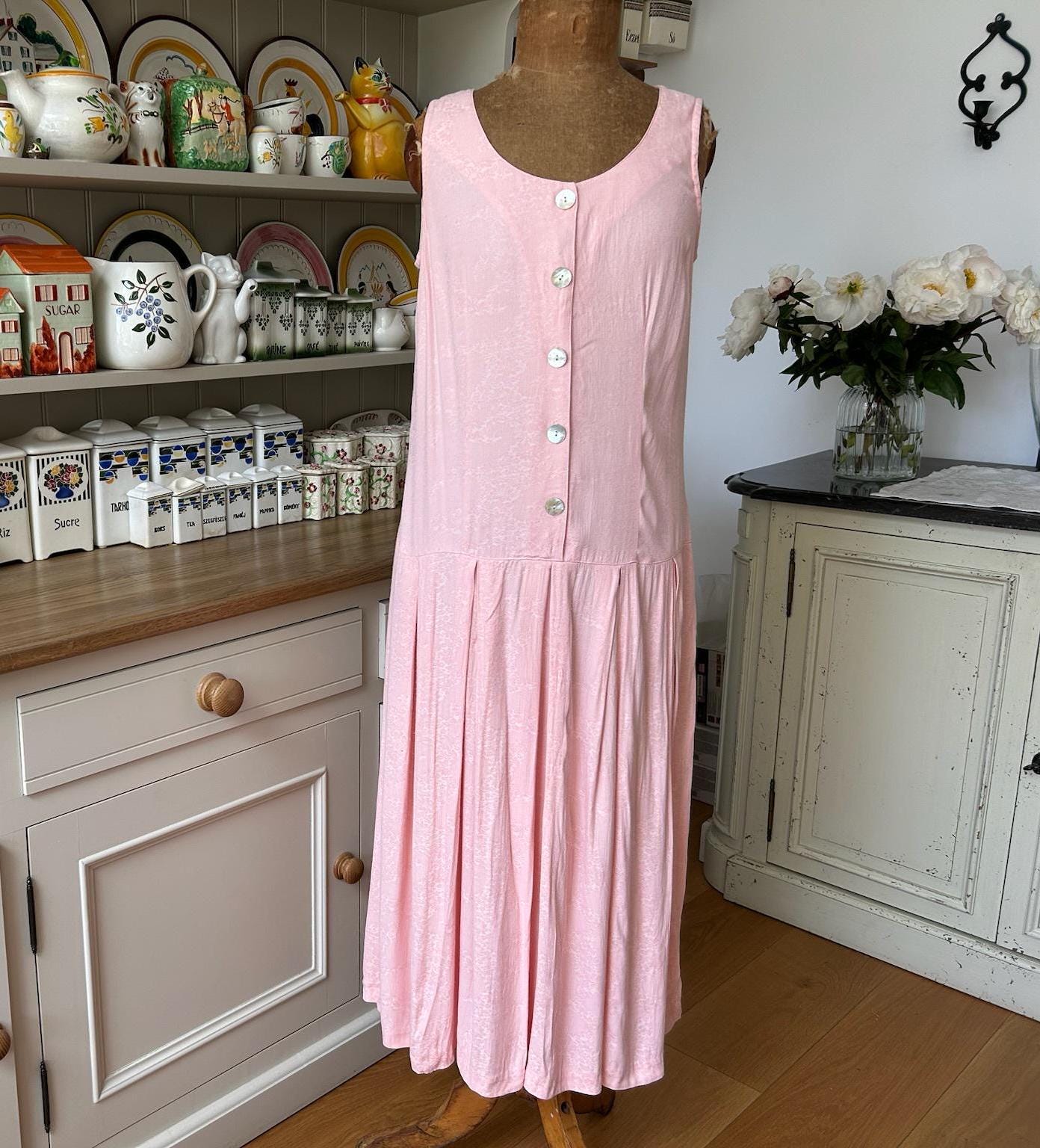 beckett mini dress in dusty pink Beckett A-Line Wide-Ribbed Sweater Mini Skirt (Brown) Medium main image 0
