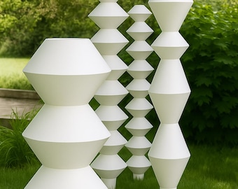 Modern Metal Garden Sculpture: Geometric Stacked Cone Totem