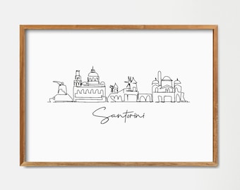 Könnte beinhalten: Eine Schwarzweiß-Linienzeichnung der Skyline von Santorini, mit dem Text "Santorini" unterhalb der Zeichnung. Die Zeichnung ist in einem hellen Holzrahmen gerahmt und hängt an einer weißen Wand.