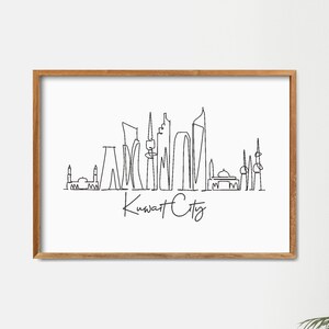 May include: A framed black and white line drawing of the Kuwait City skyline. The drawing is in a simple line style and includes the text "Kuwait City".