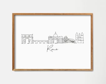 Könnte beinhalten: Eine gerahmte Schwarzweiß-Linienzeichnung der Skyline von Rom mit dem Wort "Rom" darunter. Die Zeichnung ist auf weißem Hintergrund und der Rahmen ist aus hellem braunem Holz.