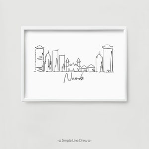 Puede incluir: Un dibujo lineal minimalista enmarcado del horizonte de Nairobi en tinta negra sobre papel blanco. La palabra "Nairobi" est&aacute; escrita en cursiva debajo del horizonte. La frase "Simple Line Draw" est&aacute; escrita en la parte inferior.
