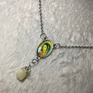 Mother Mary tooth necklace