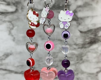 Amuleto para teléfono con forma de corazón y ojo turco / Amuleto de gatito