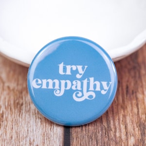 May include: A blue button with the text "try empathy" in white.