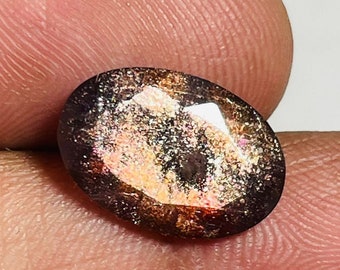 Golden fire bloodshot oval cut,3.30cts.