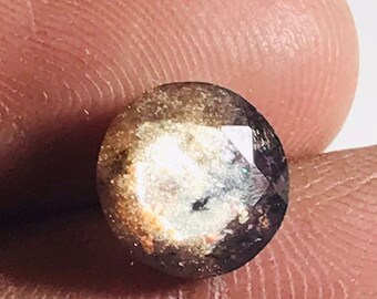 9MM,golden fire natural bloodshot round cut.
