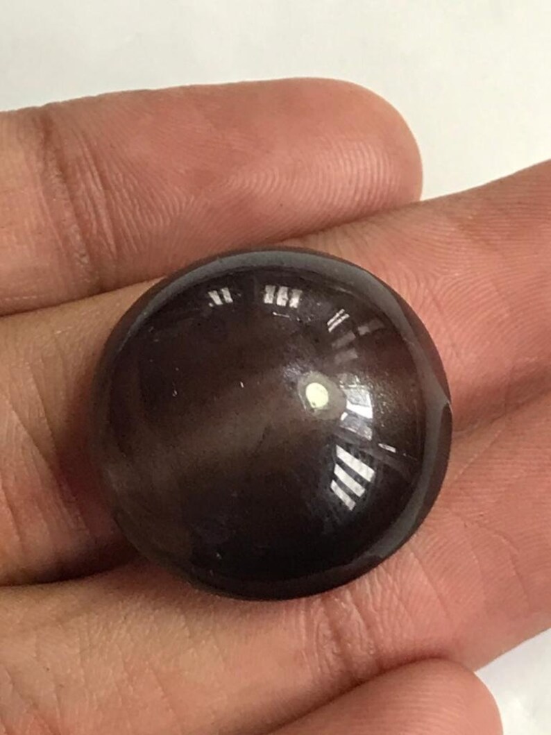NATURAL CATSEYE CABOCHON.46.20CTS.24*11MM