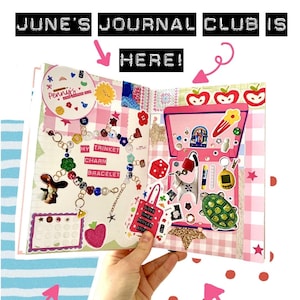May include: An open journal page featuring the text JUNE'S JOURNAL CLUB IS HERE! The layout includes a charm bracelet illustration, a pink case graphic, various stickers like a turtle, red dice, and a yellow digital pet, all on a pink gingham background.