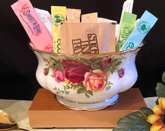 Small, open bowl: Royal Albert's "Old Country Roses" design. Fine porcelain, 22 karat gold. 4 inches by 2.5 tall. Vanity items, sugar, etc.