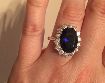 ROYAL * Size 7 Sapphire-colored fashion ring; Lady Di/Princess Kate replica: so sparkly! * 12-carat center stone! Only available in Sz. 7 US