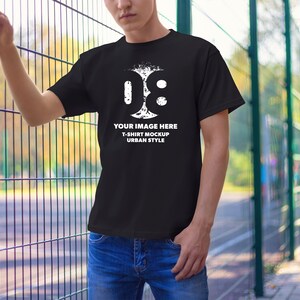 Young Men Model in a Black T-shirt Mock Ups