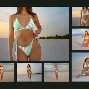 May include: A woman wearing a green and white tropical print bikini on a white sandy beach.