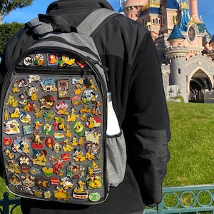 The ShowCase 3.0 - Ita Bag, Pin Display Bag, Clear Pocket Display Backpack, Pin Trading Bag, Window Backpack, Pin Display Laptop Backpack