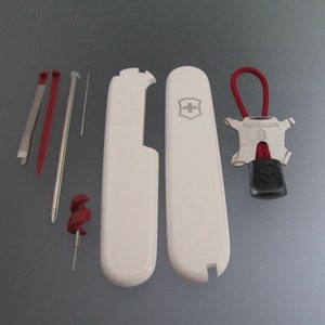 SCALES “+” 91 mm Victorinox PLUS White Scales and Red Equipment
