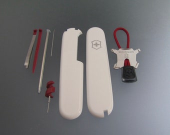 SCALES “+” 91 mm Victorinox PLUS White Scales and Red Equipment