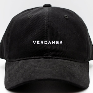 May include: A black baseball cap with a white embroidered logo that says "VERDANSK"