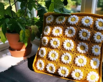 Handmade crochet daisy cushion cover.