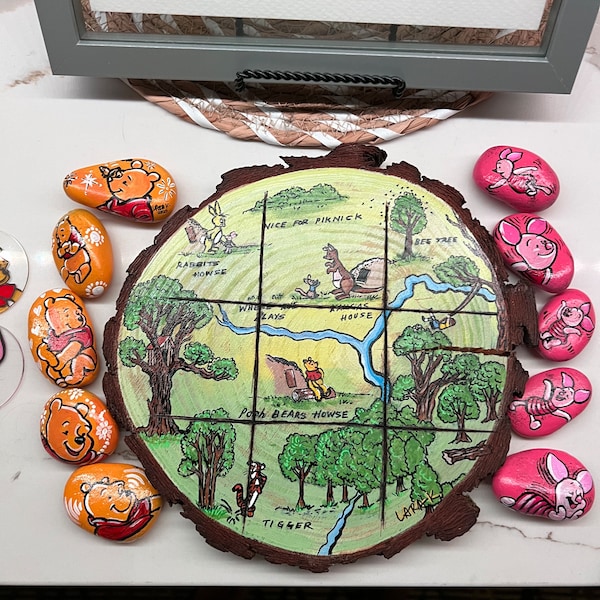 Hand painted Rocks Tic-Tac-Toe set. Set of 10 Winnie the pooh themed rocks and a wood slice, hand painted. One of a kind, unique.