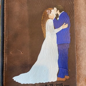 Hand painted silhouette style Wedding portrait on a leather notebook