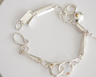 Silver Bracelet with Interlocking Chaos Design and Leftover New Parts