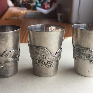 Matched Set of Three (3) Vintage Chinese Export Silver Baijiu Cups. 1850 - 1950. Dragon Motif in Deep Relief.