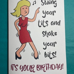 May include: A birthday card featuring a cartoon woman in a red dress dancing. The card's text reads "Swing your tits and shake your bits! It's your birthday!" in black and burgundy lettering.