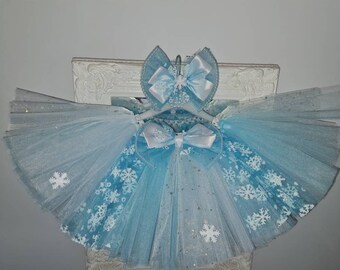 Girls tutu skirt frozen inspired theme puffy big layers snowflakes birthday party events handmade blue sparkly glittery matching hairbow
