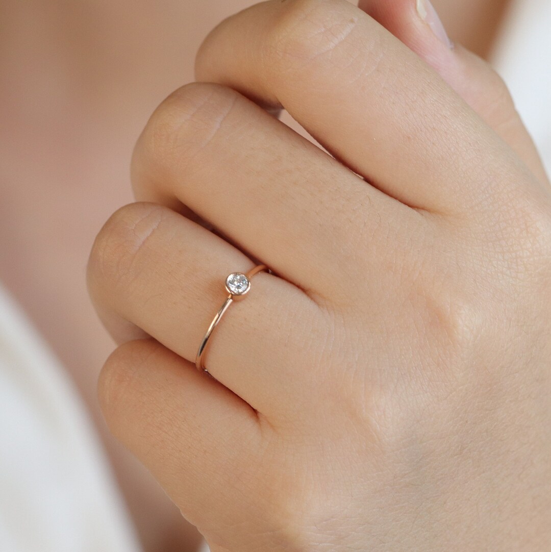 Single small diamond on sale ring