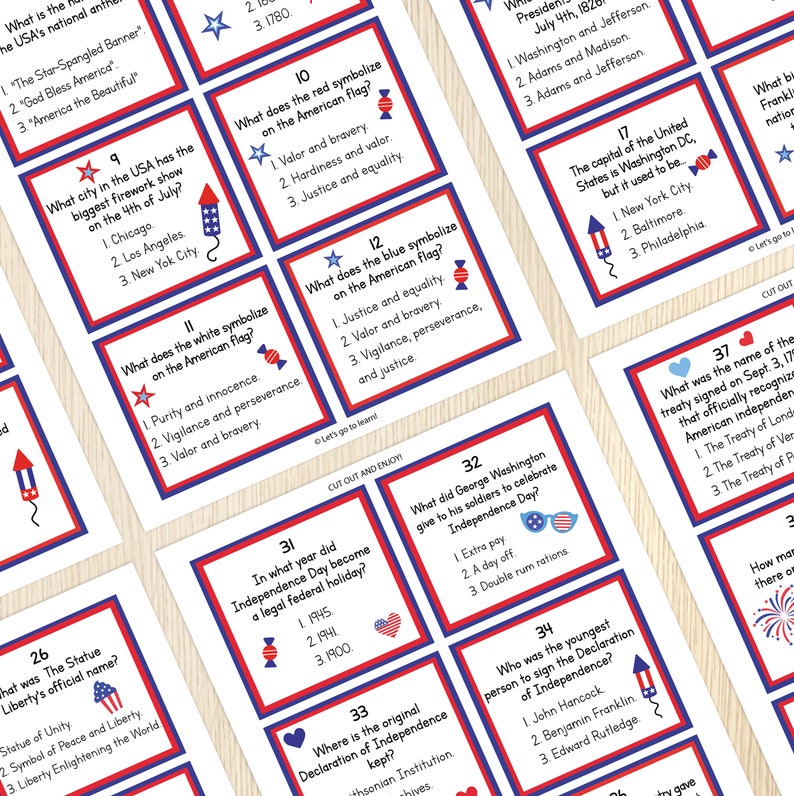 May include: A set of 10 red, white, and blue cards with trivia questions about American history and Independence Day. Each card features a star, a heart, or a firework graphic. The cards are designed to be cut out and enjoyed.