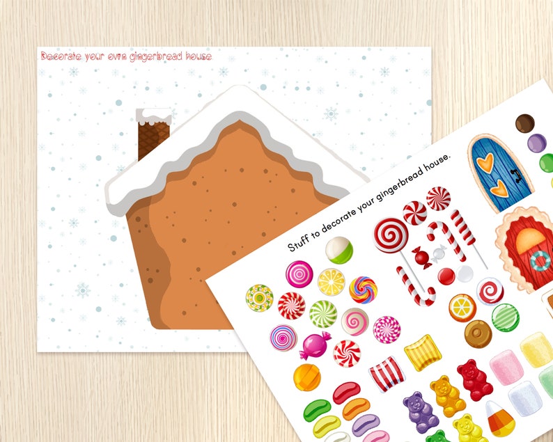 May include: A gingerbread house outline with white frosting and a chimney, alongside a sheet of colorful candy stickers. The text reads "Decorate your own gingerbread house" and "Stuff to decorate your gingerbread house."