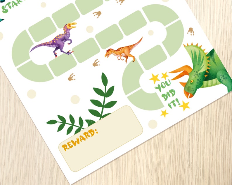 Puede incluir: Un gr&aacute;fico imprimible de tem&aacute;tica de dinosaurios verde y blanco con un camino para que los ni&ntilde;os sigan. El gr&aacute;fico incluye una ilustraci&oacute;n de dinosaurio, una secci&oacute;n de recompensa y el texto "You Did It!"