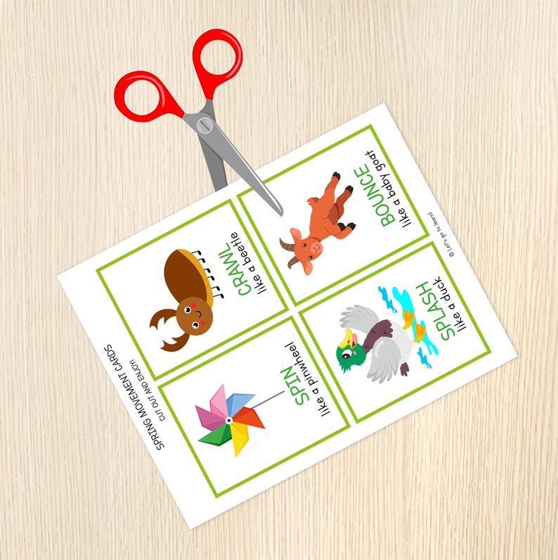 May include: A sheet of spring movement cards with illustrations and text, including a beetle, goat, duck, and pinwheel. Red scissors are cutting the cards. The text says "Cut out and enjoy!"