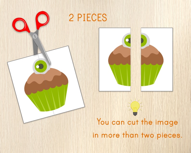 May include: A white card with a cartoon cupcake design, cut in two pieces, with a pair of red-handled scissors. The cupcake has a brown top, green base, and a single eyeball on top. Text reads "2 PIECES" and "You can cut the image in more than two pieces."
