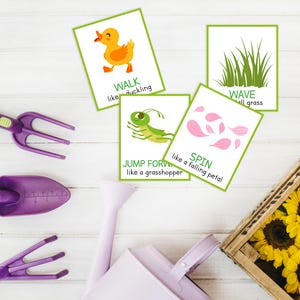 May include: Four illustrated cards with green borders and text: "WALK like duckling", "WAVE tall grass", "JUMP FORWARD like a grasshopper", and "SPIN like a falling petal". Gardening tools and a watering can in shades of purple are also visible.