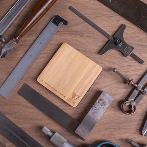 Tools laid out on a workbench.