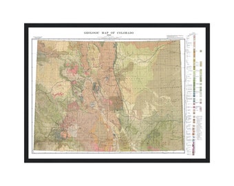 May include: A vintage geologic map of Colorado from 1913. The map is printed in black and white with colored lines and dots indicating different geological formations. The map is framed in a black frame.