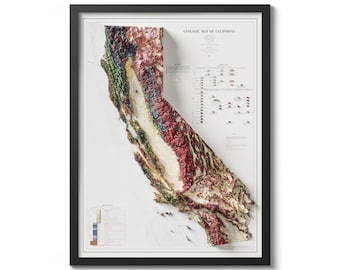 May include: A framed geological map of California with a 3D relief of the state. The map is printed on white paper with a detailed colour-coded key. The map is framed in black.
