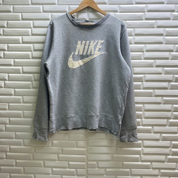 nike swoosh grey jumper