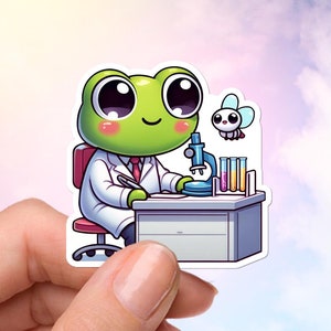 May include: A green frog wearing a white lab coat and a red tie sits at a desk with a microscope and test tubes. A small purple and yellow butterfly flies above the frog.