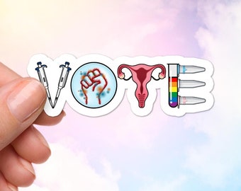 May include: A sticker featuring the word "VOTE" created from medical and scientific symbols. The "V" is made of pipettes, the "O" a fist, the "T" a uterus, and the "E" test tubes with rainbow colours.