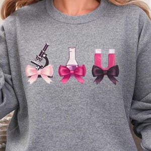 Coquette Science Bows Sweatshirt, Women in STEM, Gift for a Science Teacher, Steminist, Feminist, Scientist, Great for Valentine&#39;s Day