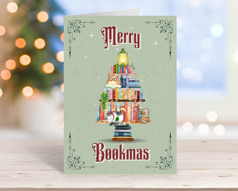 Merry Bookmas Card made by ScienceAndSnark of a light green background with three made out of filled bookshelves with the bottom a stack of books to keep the tree standing.