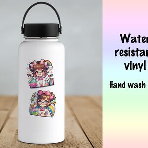 May include: White water bottle with two colorful stickers featuring a cartoon scientist girl with brown hair, glasses, and a lab coat. The stickers have a rainbow, butterflies, and lab equipment. Text on the right says "Water resistant vinyl" and "Hand wash only."