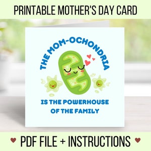 May include: Printable Mother's Day card featuring a cartoon illustration of a green mitochondrion with a smiling face and the text "The Mom-ochondria is the powerhouse of the family".