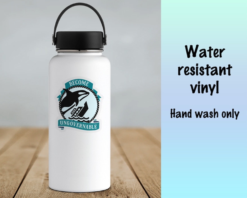 May include: White water bottle with a black lid and handle. A sticker with a black orca jumping out of the water and a sinking ship is on the bottle. The sticker says "Become Ungovernable".