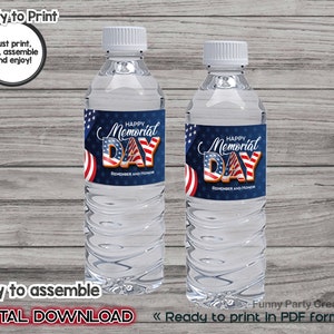 May include: Two clear plastic water bottles with labels that say "Happy Memorial Day" in gold letters with an American flag design. The labels also say "Remember and Honor".