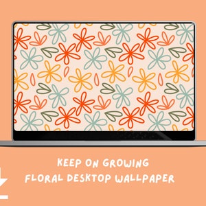 May include: A laptop computer displaying a floral desktop wallpaper with a light pink background and a pattern of orange, yellow, and blue flowers. The text "KEEP ON GROWING FLORAL DESKTOP WALLPAPER" is displayed below the laptop.