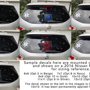 May include: Nine different colour variations of a decal featuring a medical symbol with the text "Save The Child" and "Medical Info On Board" are shown on the rear window of a silver car. The decals are mounted on clear acrylic and are shown on a 2016 Nissan Pathfinder for sizing reference.