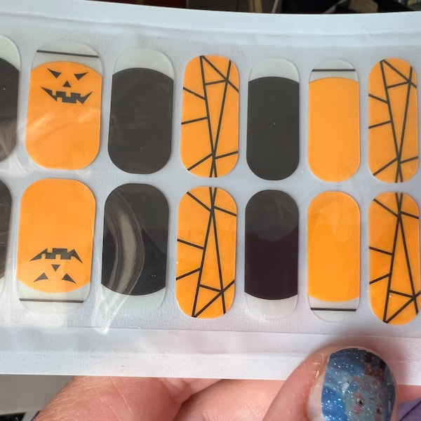 100% Nail Polish Strips Orange and Black Halloween tips.